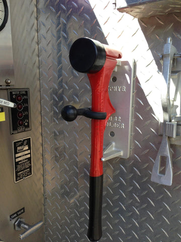 Span-hammer mounted Vertically in holder on Fire truck