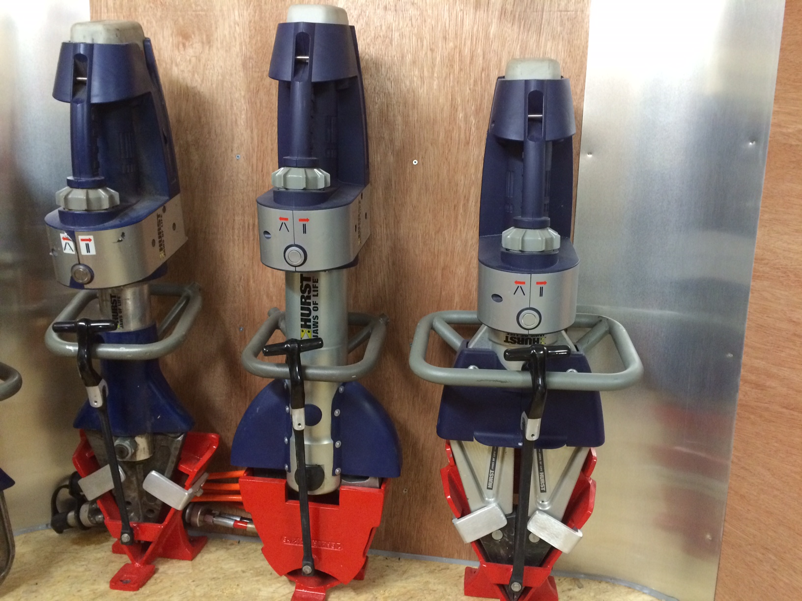 Rescue tool mounting brackets